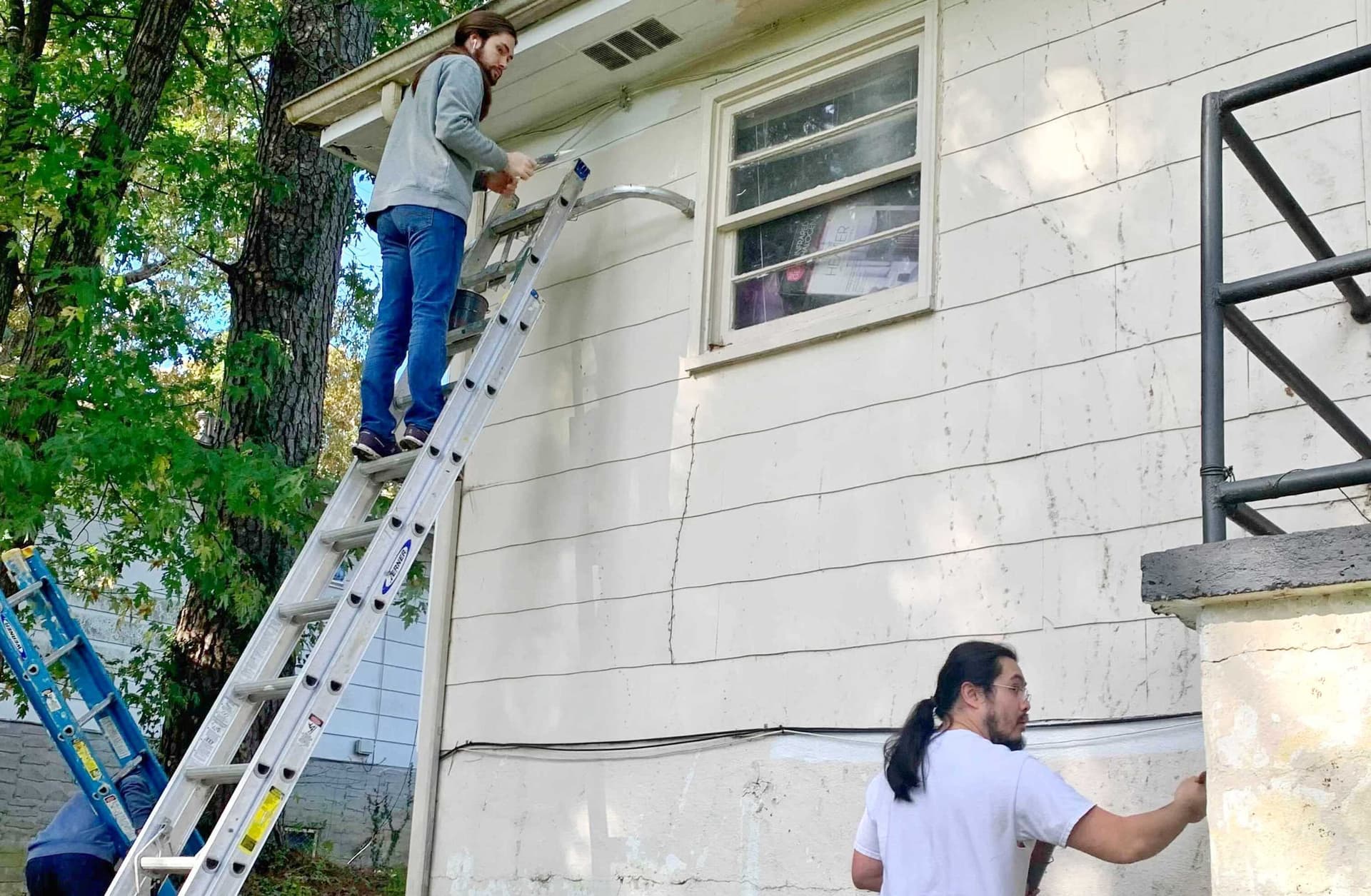 Volunteers working on a widow's home